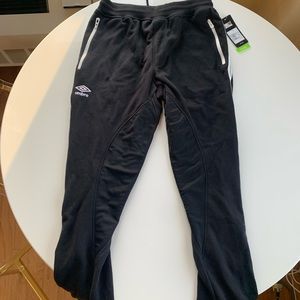 Umbro men’s track sweatpants in size medium with tags attached.